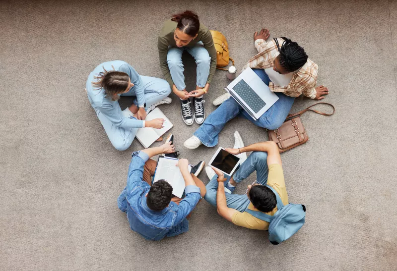 A group of students sitting and talking